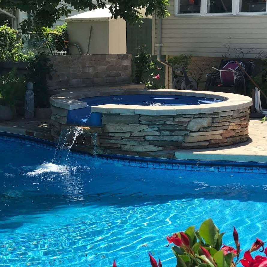 Backyard pool and hot tub living space