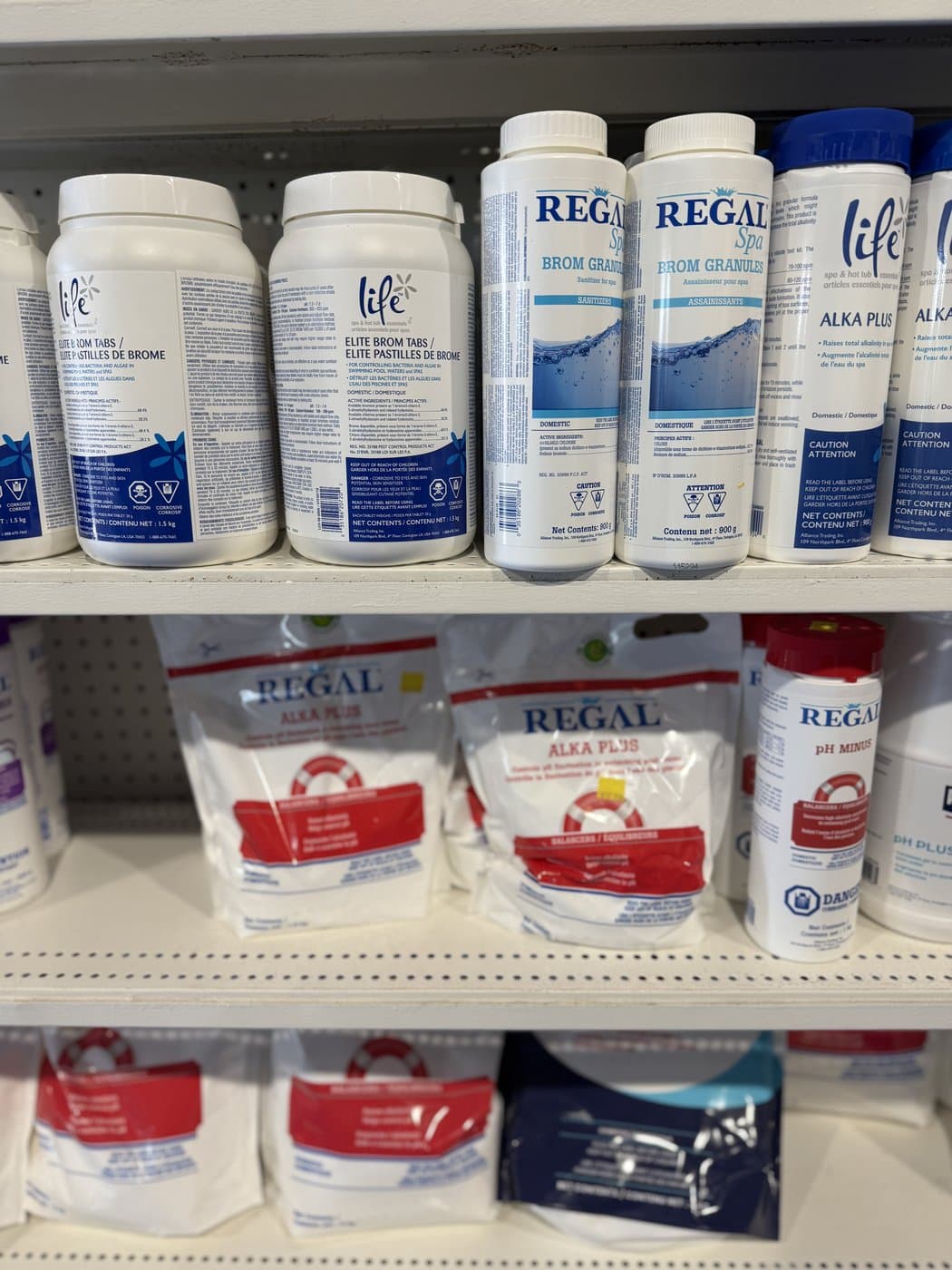 Fully stocked chemical shelves at Pools R Us